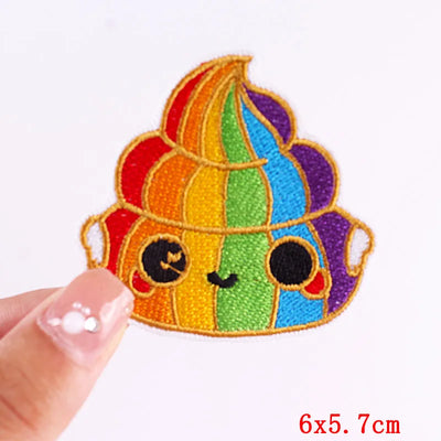 Colorful ice cream-shaped patch held by a hand with a white background