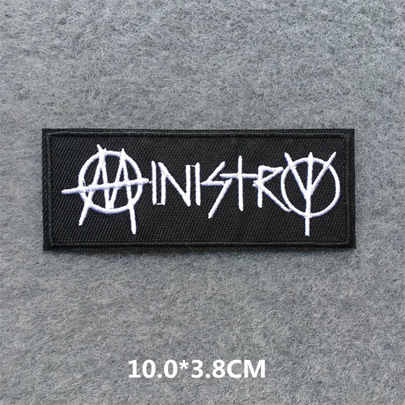 Ministry logo patch on a gray background with dimensions displayed.