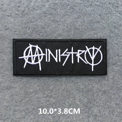 Ministry logo patch on a gray background with dimensions displayed.