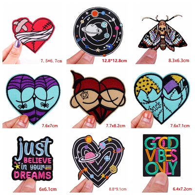 Collection of various patches held by fingers with dimensions indicated, on a white background.