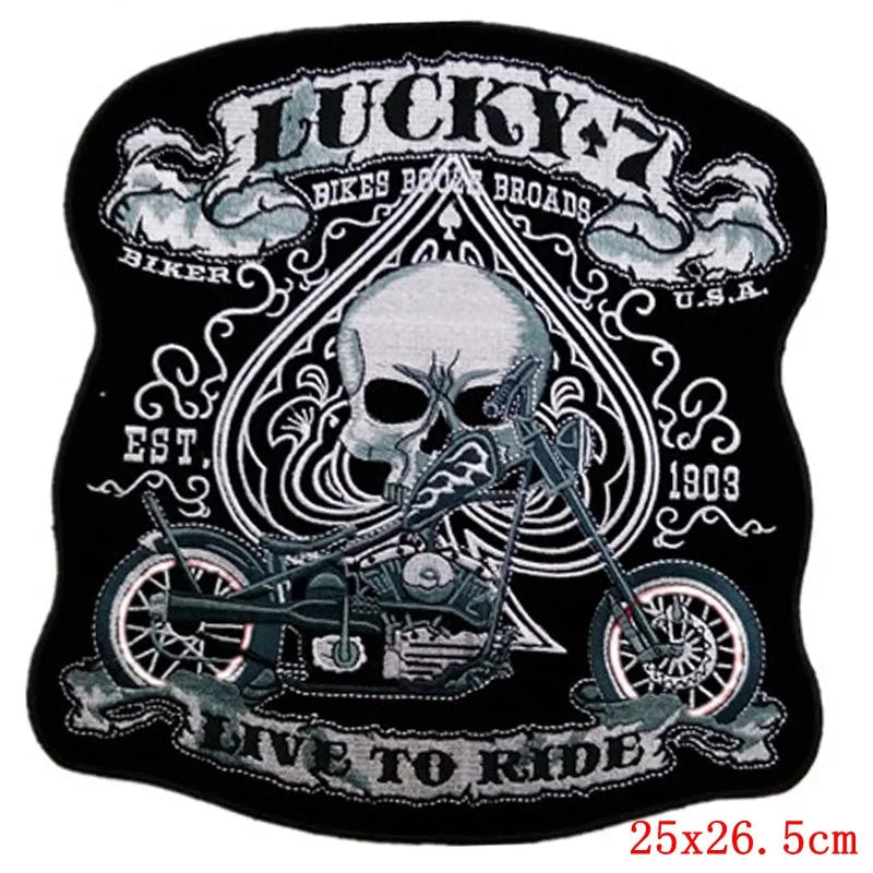 Biker patch with skull, motorcycle, and text on a black background