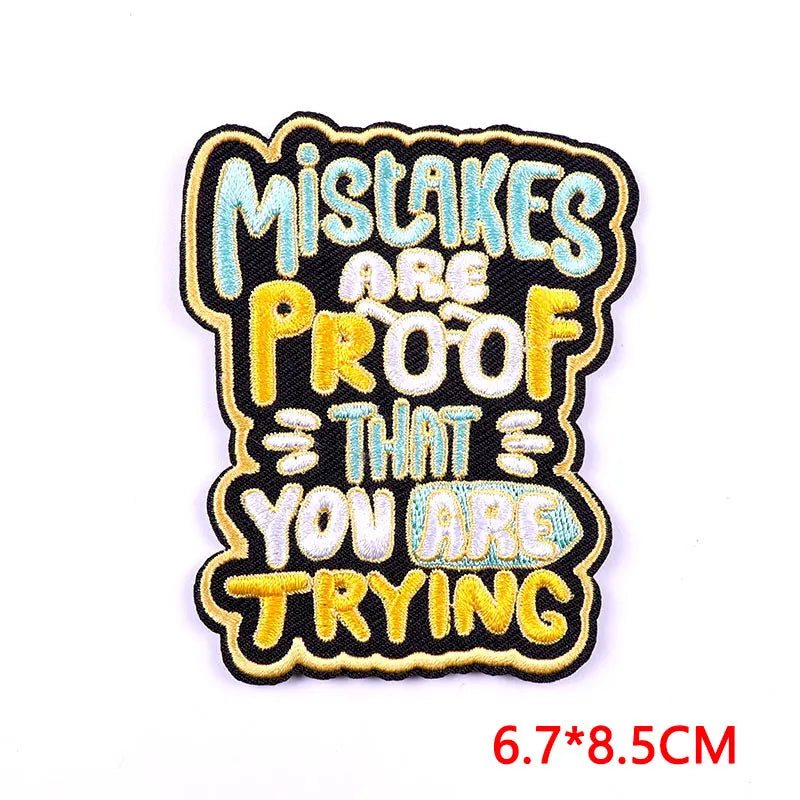 Embroidered patch with motivational text on a white background