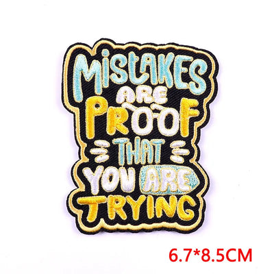 Embroidered patch with motivational text on a white background