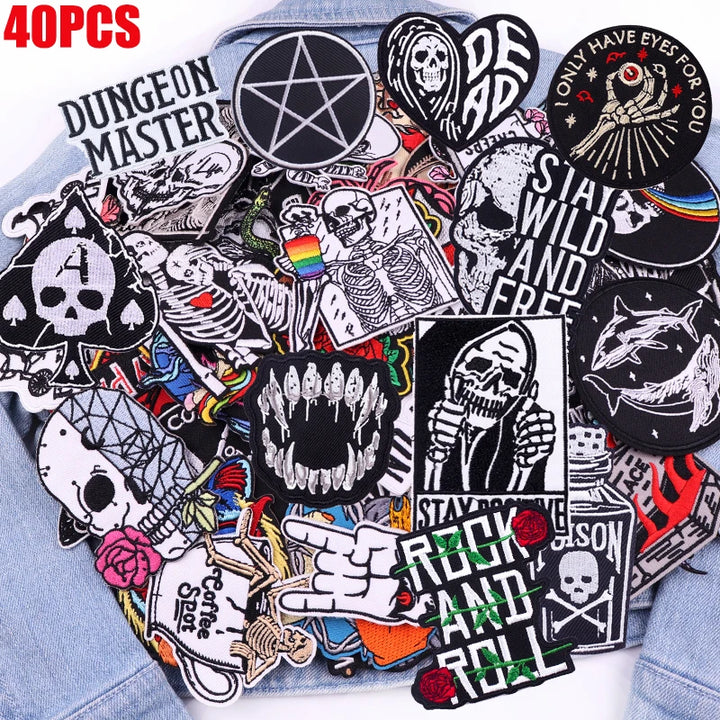 Collection of various patches 40 pcs with different designs on a blue denim background