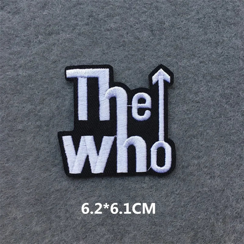 black and white The Who embroidered iron-on patch 6.2x6.1cm on a grey background