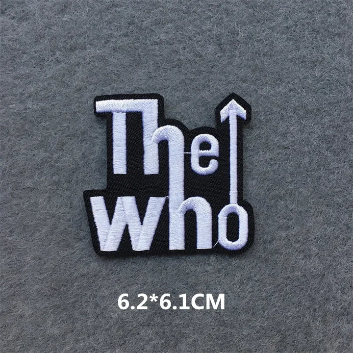 black and white The Who embroidered iron-on patch 6.2x6.1cm on a grey background