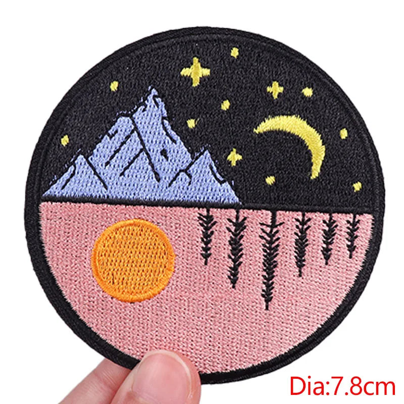Circular patch with mountain and nature design held by a hand, labeled 'Dia:7.8cm'.