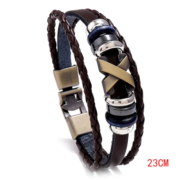 Brown braided leather bracelet with metal accents on a white background