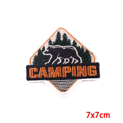 Embroidered patch with bear design and 'Camping' text on a white background