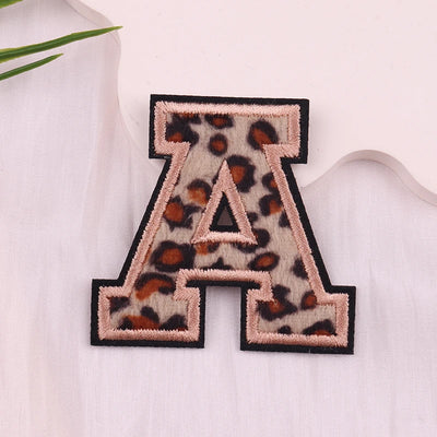 Leopard print letter 'A' patch on a white background