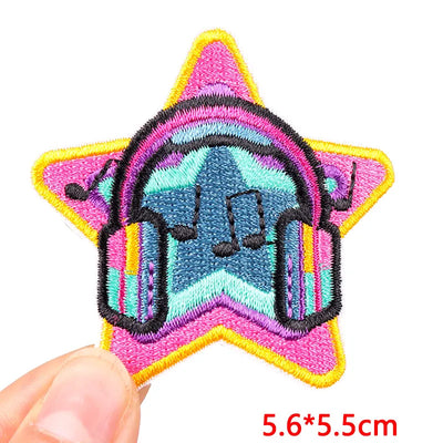 Colorful star-shaped patch with a hand holding it on a white background