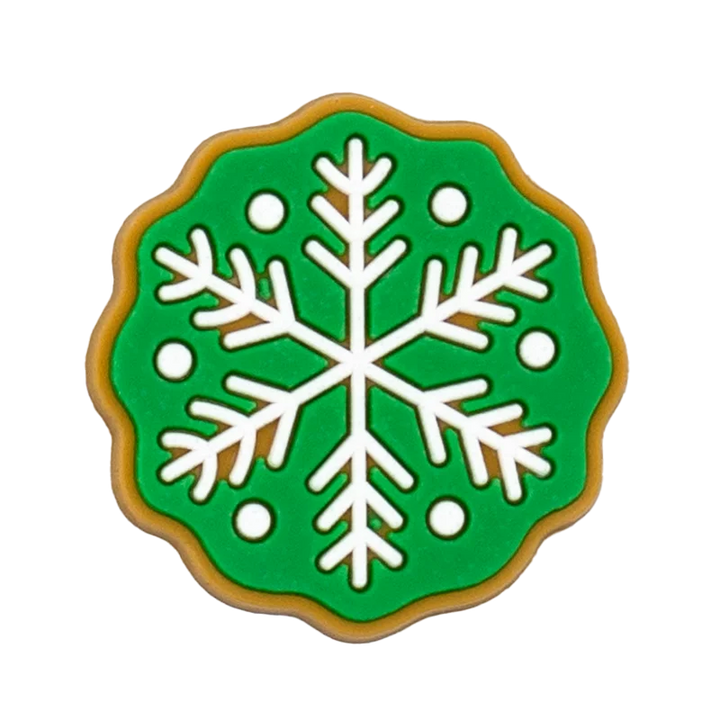 Shoe charm ornament of Decorative cookie with a snowflake design on a green background