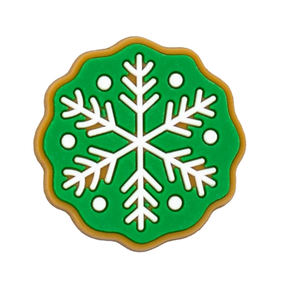 Shoe charm ornament of Decorative cookie with a snowflake design on a green background