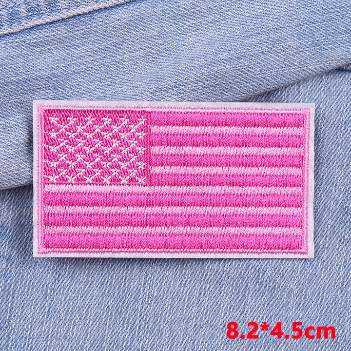 Pink American flag patch on denim fabric with dimensions displayed