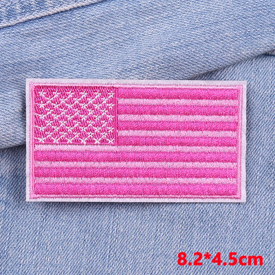 Pink American flag patch on denim fabric with dimensions displayed