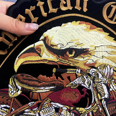 Embroidered patch with an eagle design on a black background