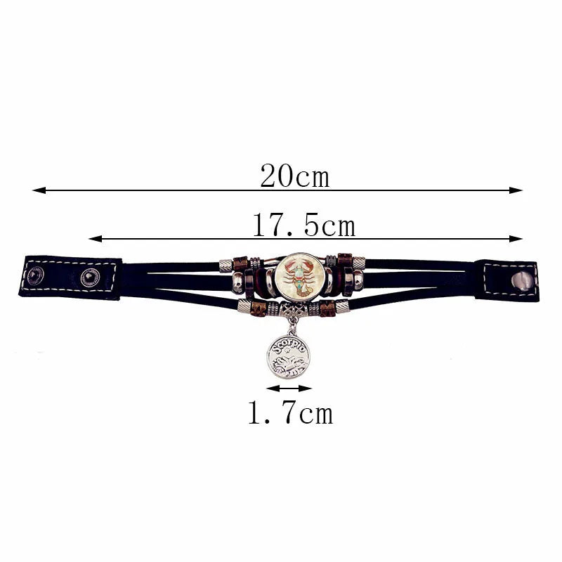 Black leather choker with charms and measurements on a white background