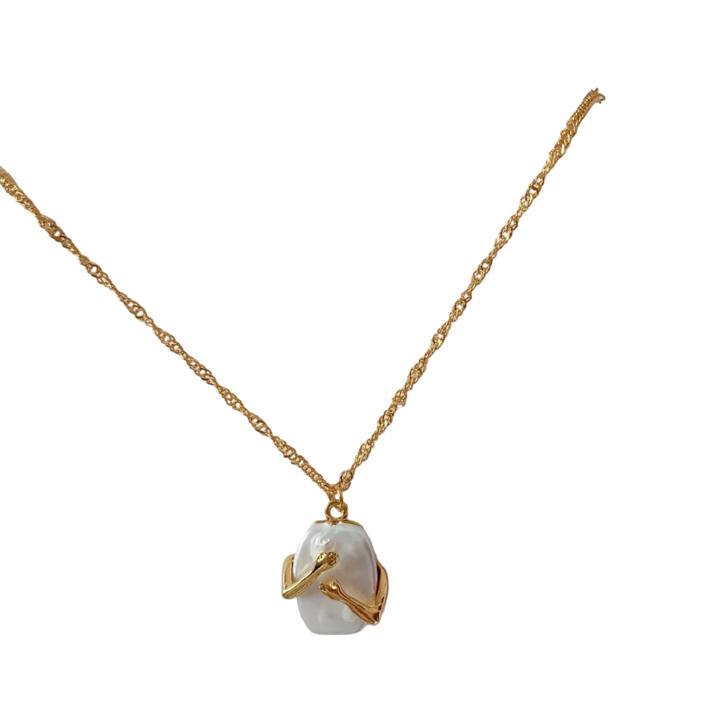 Gold necklace with a pearl pendant on a white background
