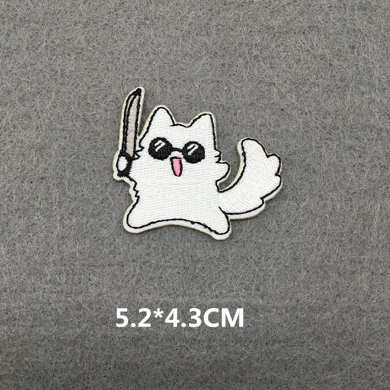 White ghost character with black eyes and a pink tongue on a gray background, with size measurement '5.2*4.3CM'.