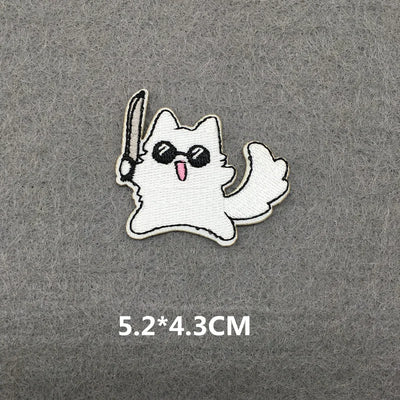 White ghost character with black eyes and a pink tongue on a gray background, with size measurement '5.2*4.3CM'.