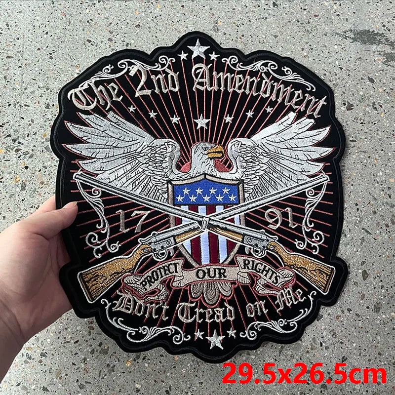 Large patch with eagle design, American flag, and text on a textured surface