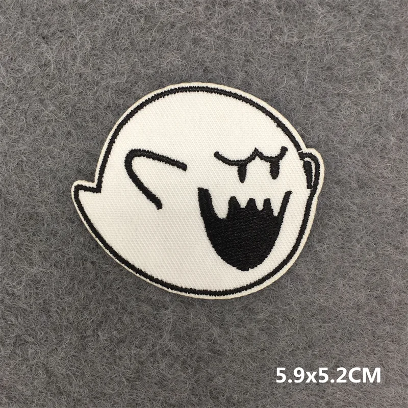 Ghost-shaped patch with a sad expression on a gray background