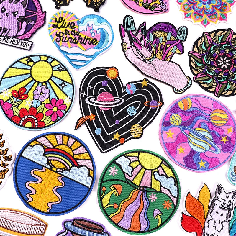 Collection of colorful patches with various designs on a white background