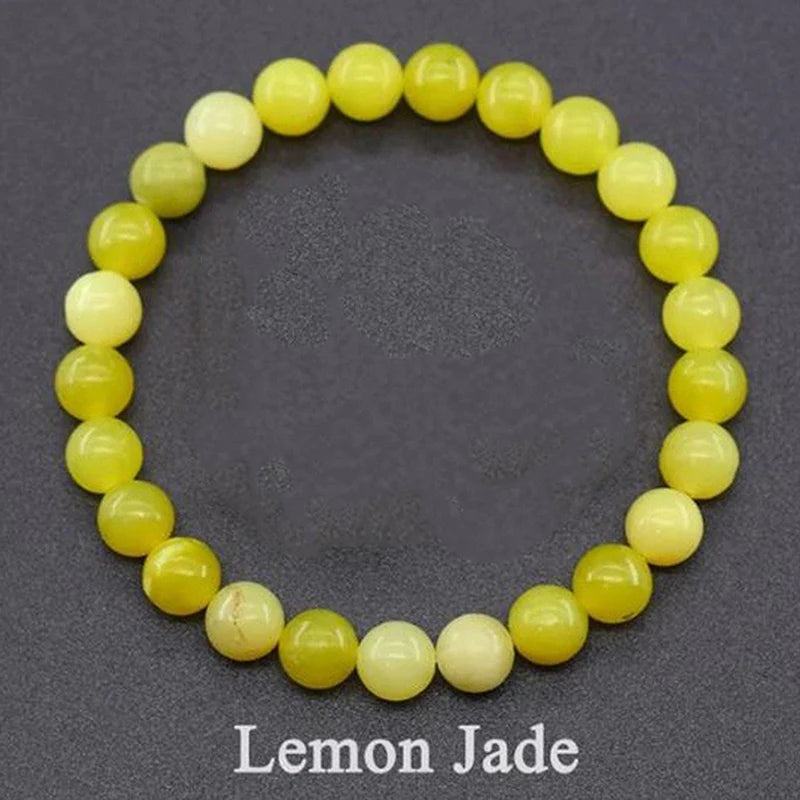 Lemon jade beaded bracelet on a dark gray background