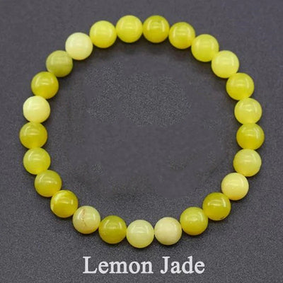 Lemon jade beaded bracelet on a dark gray background