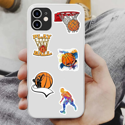 Phone case with basketball-themed stickers held by a person