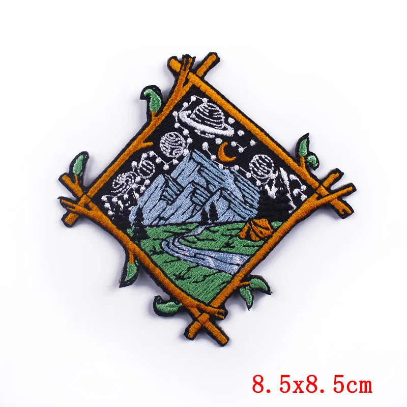 Embroidered patch with nature design and bamboo frame on a white background