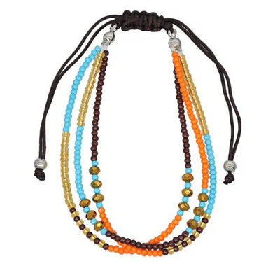 Multicolored beaded necklace with black cord on a white background
