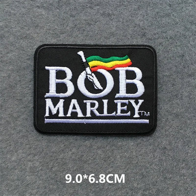 Bob Marley patch with Rastafarian flag on a gray background