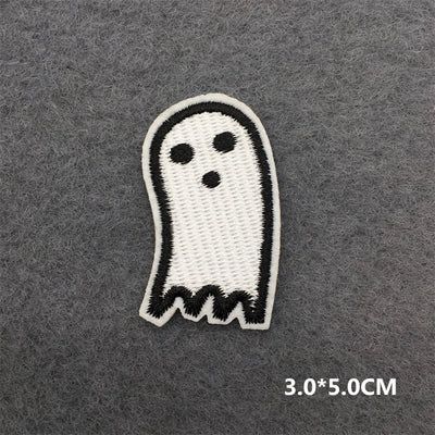 Embroidered ghost patch on a gray background