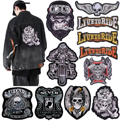 Black denim jacket with embroidered patches and 'Live to Ride' text on a white background