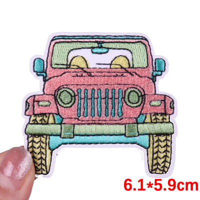 Colorful cartoon-style jeep patch held by a hand with dimensions displayed.