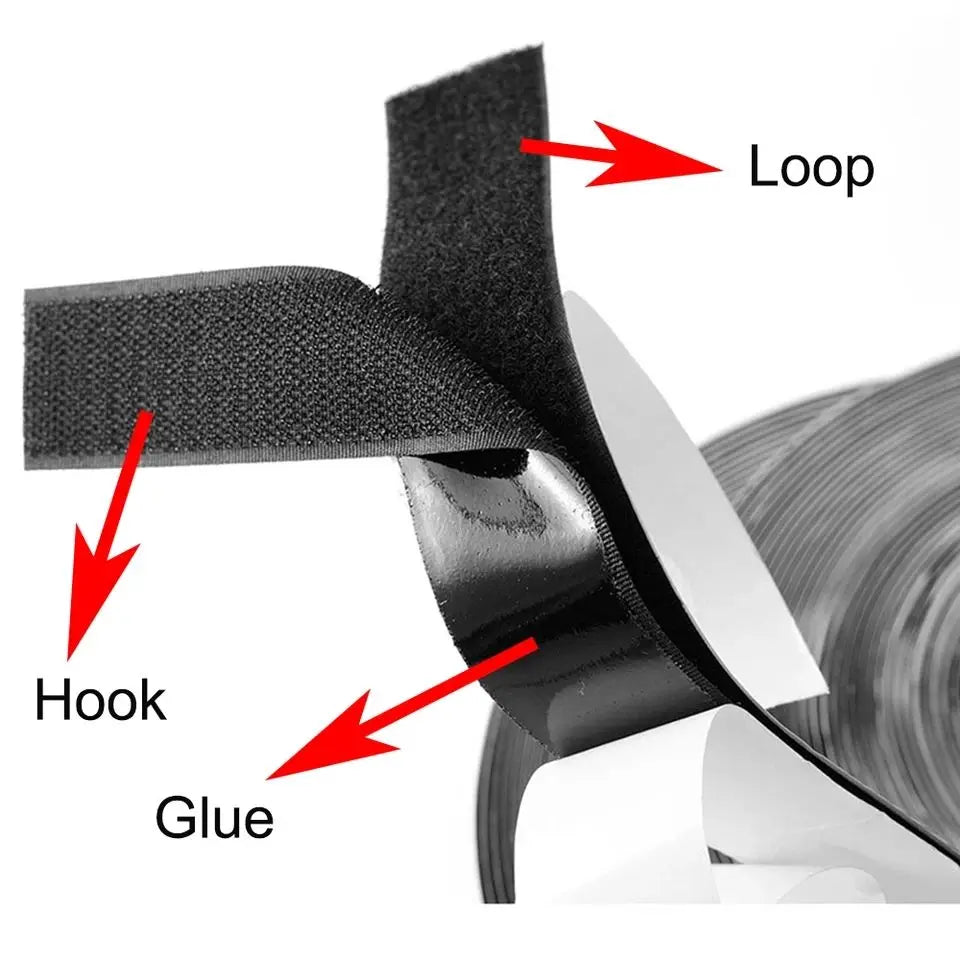 Close-up of a roll of black tape with 'Hook', 'Loop', and 'Glue' labeled.