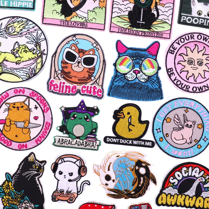 Collection of various colorful patches with different designs on a white background