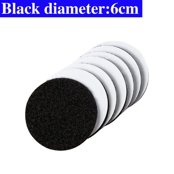Set of black Velcro round pads with a diameter of 6cm on a white background.