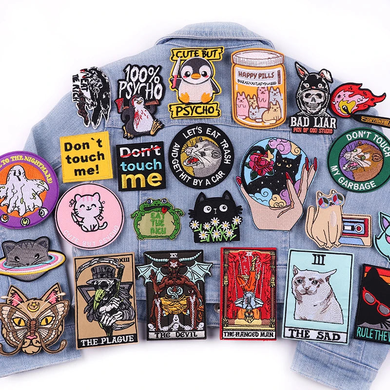 Collection of various colorful patches on a denim jacket