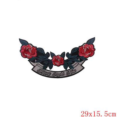 Decorative patch with red roses and a banner on a white background, featuring the brand 'Prajna'.