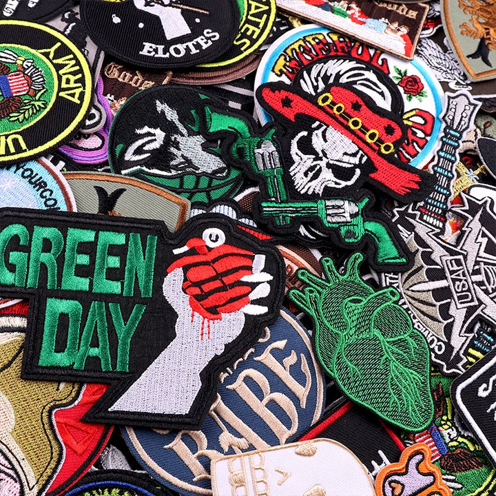 Collection of various patches with different designs and text.