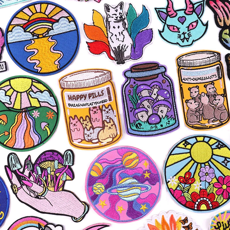 Collection of colorful patches with various designs on a white background