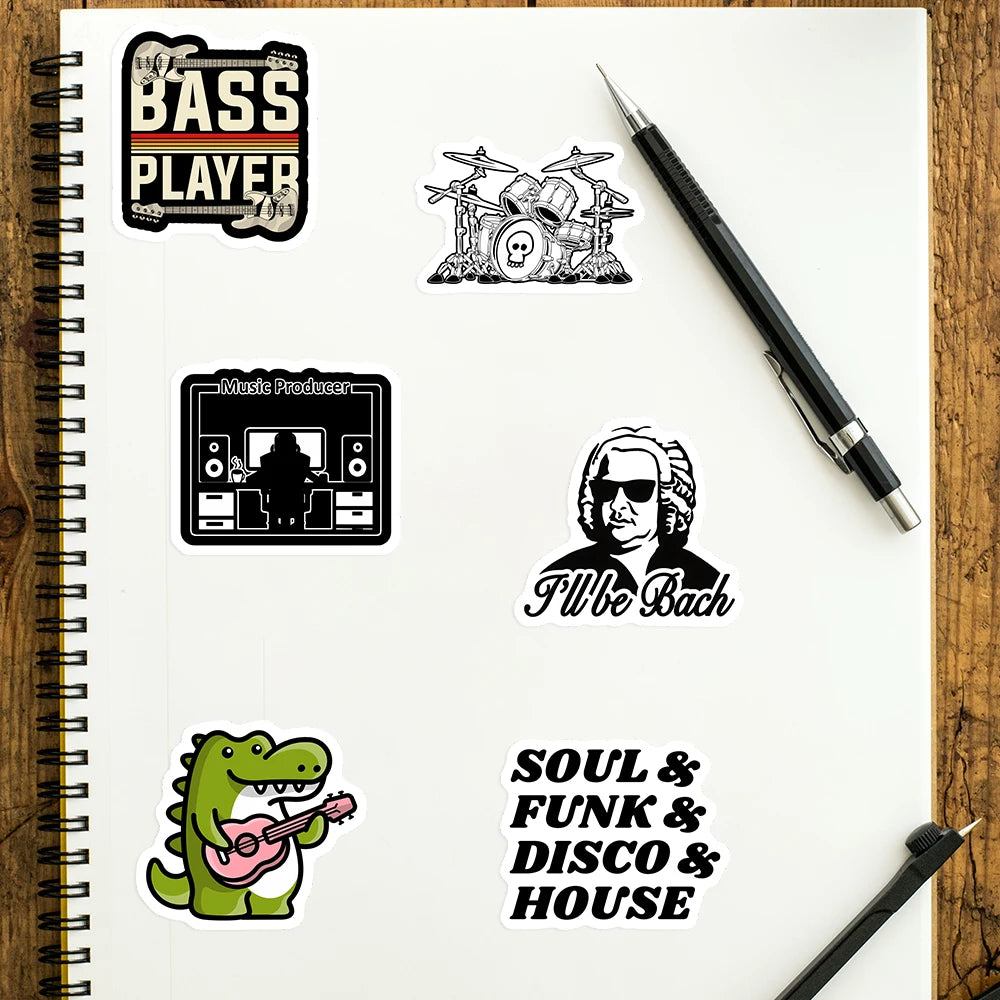 Sheet of paper with musical-themed stickers and a pen on a wooden surface