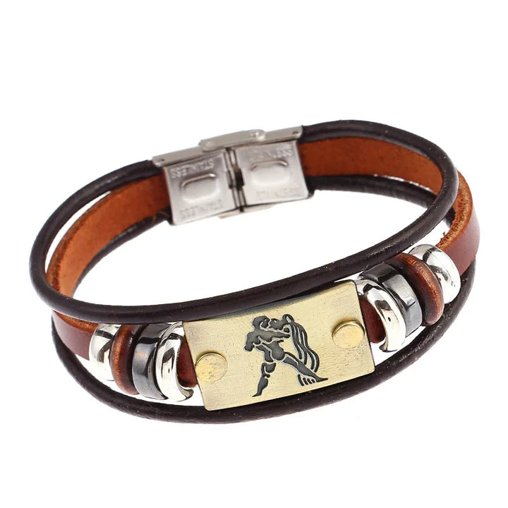 Multistrand leather bracelet with metal accents and a central emblem on a white background