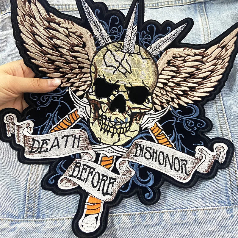 Skull patch with wings and 'Death Before Dishonor' text on denim fabric
