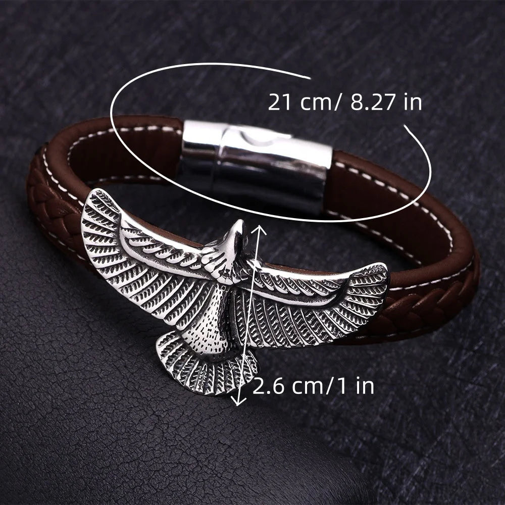 Brown leather bracelet with silver eagle design on a dark textured background with measurements