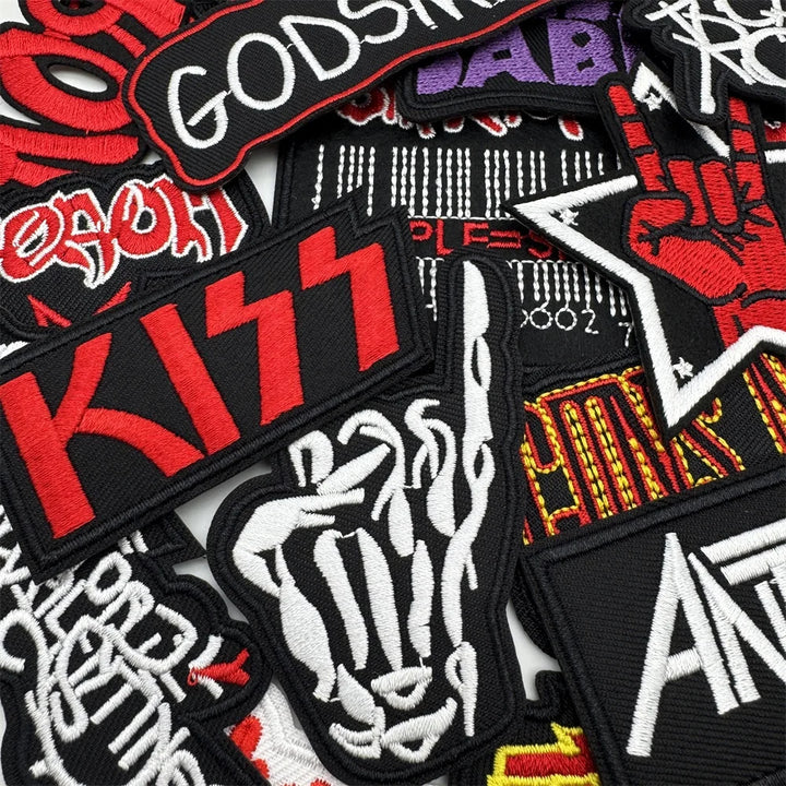 Collection of various patches with different designs and text.