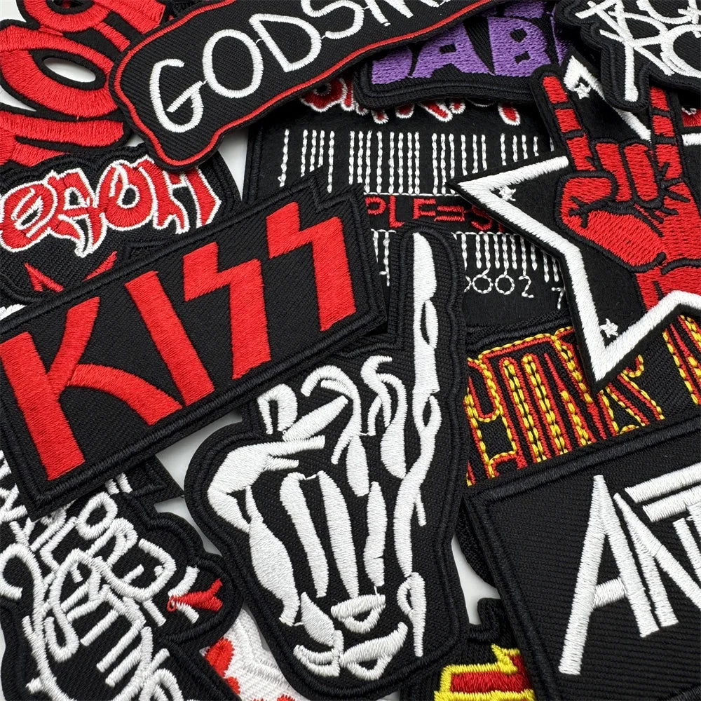 Collection of various patches with different designs and text.