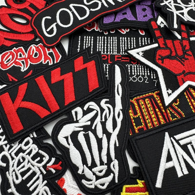 Collection of various patches with different designs and text.